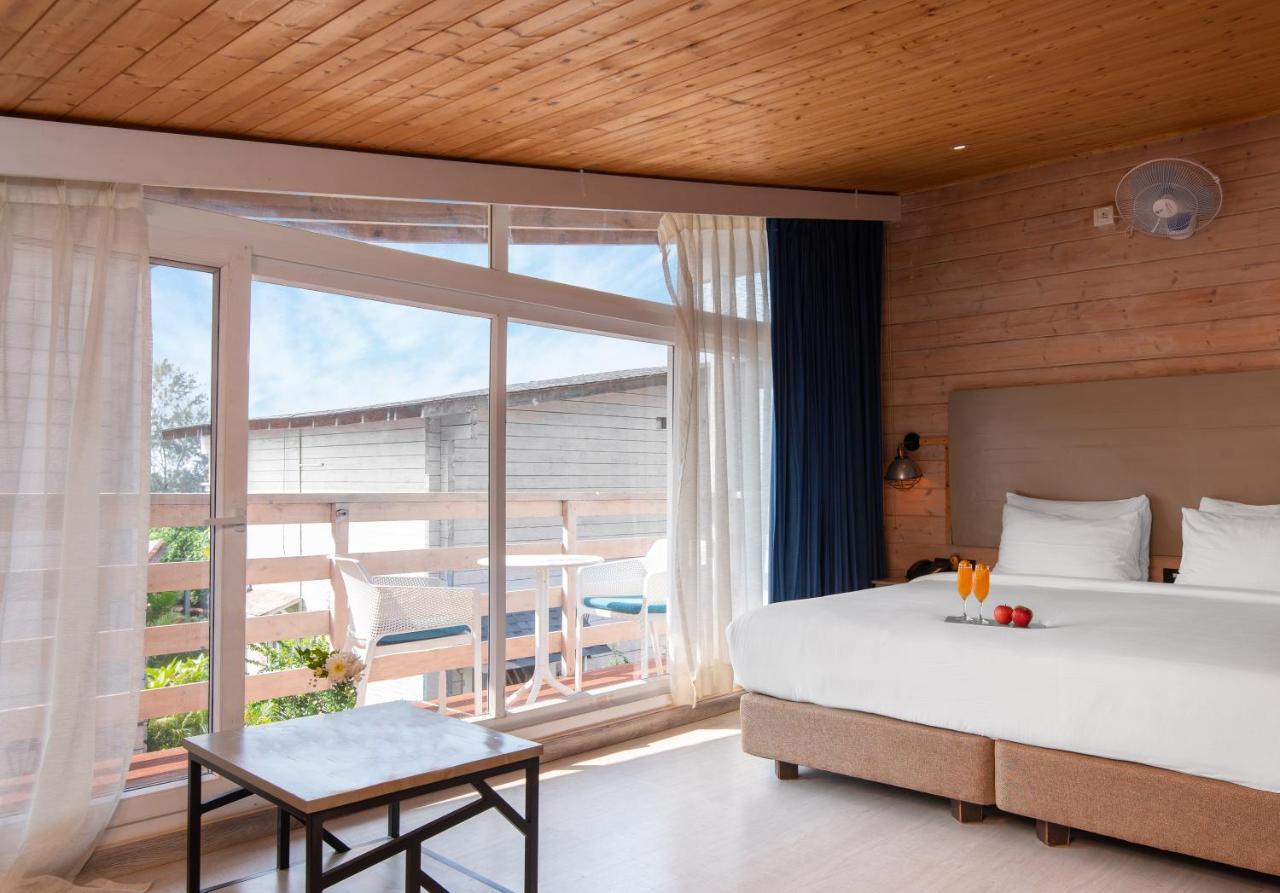 Living Room Beach Resort Morjim Exterior foto